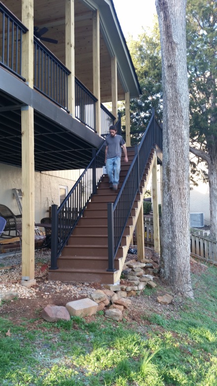 finished trex steps with aluminum hand rails